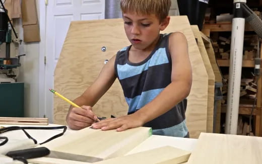 a young boy painting