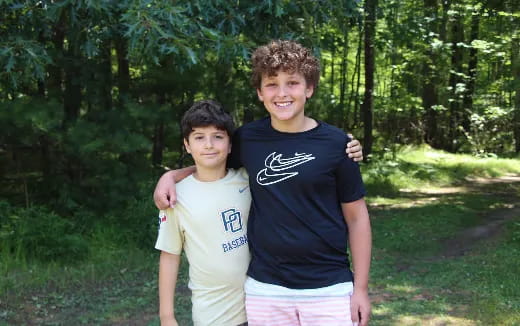 two boys standing together