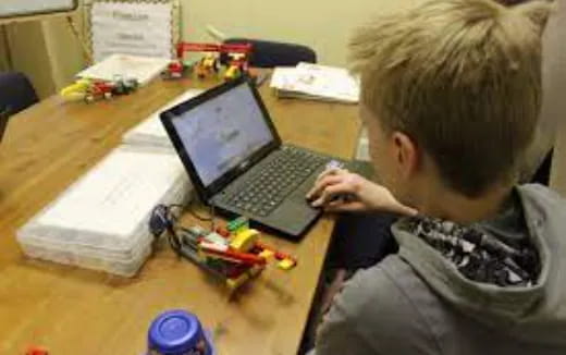 a child using a laptop